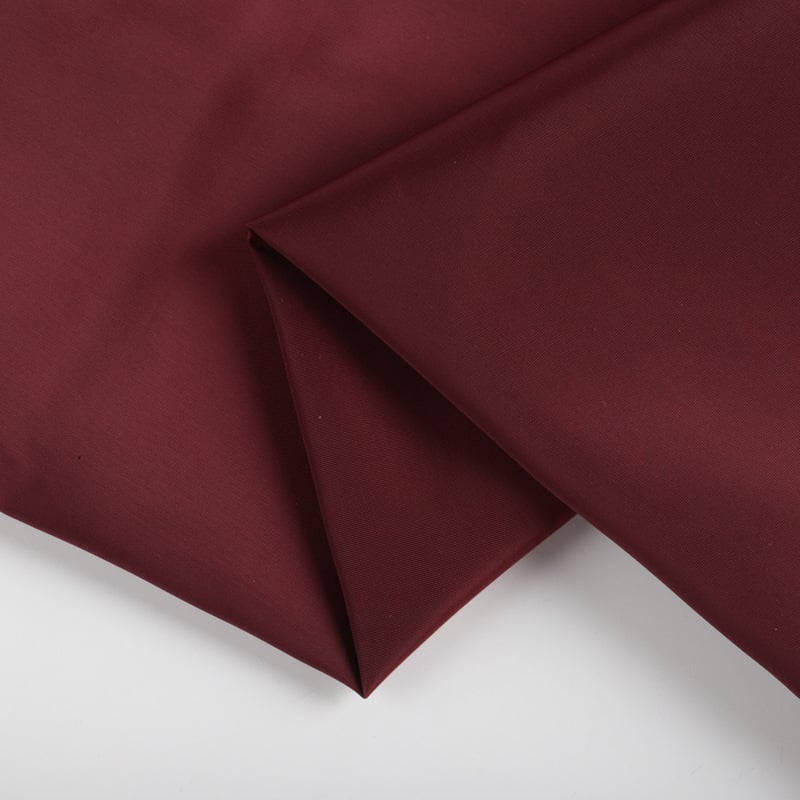 High quality 100%polyester 75D plain memory Fabric for sportswear supplier