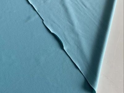 Stoffa bil-kniżża ribu, matieri versatile għall-proġetti DIY.