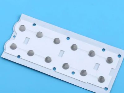 Sensibilité de l'interrupteur tactile : La science derrière les matrices de dômes métalliques