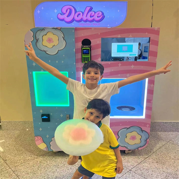 Join the fun and excitement of watching cotton candy being spun at the mall's cotton candy machine.