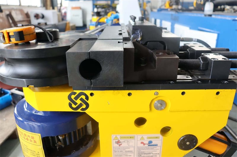 How to determine the root cause of wear on the guide rails of a pipe bending machine?