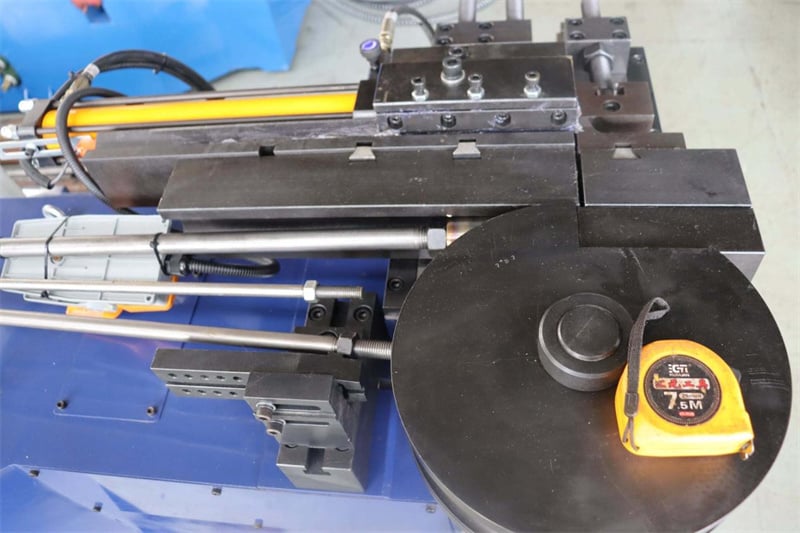 How to determine the root cause of guide rail wear on a pipe bending machine?