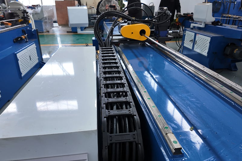 Why is maintaining the production efficiency of pipe bending machines crucial for daily production?