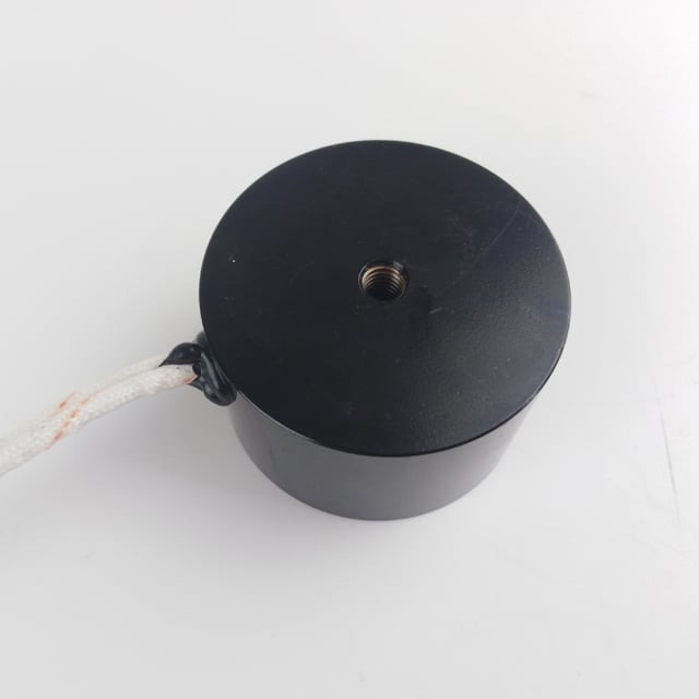 Where are DC electromagnets most commonly applied in manufacturing?