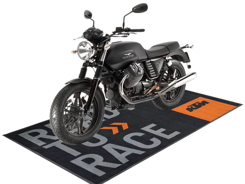 How to prevent motorcycle pit mats from slipping during maintenance?