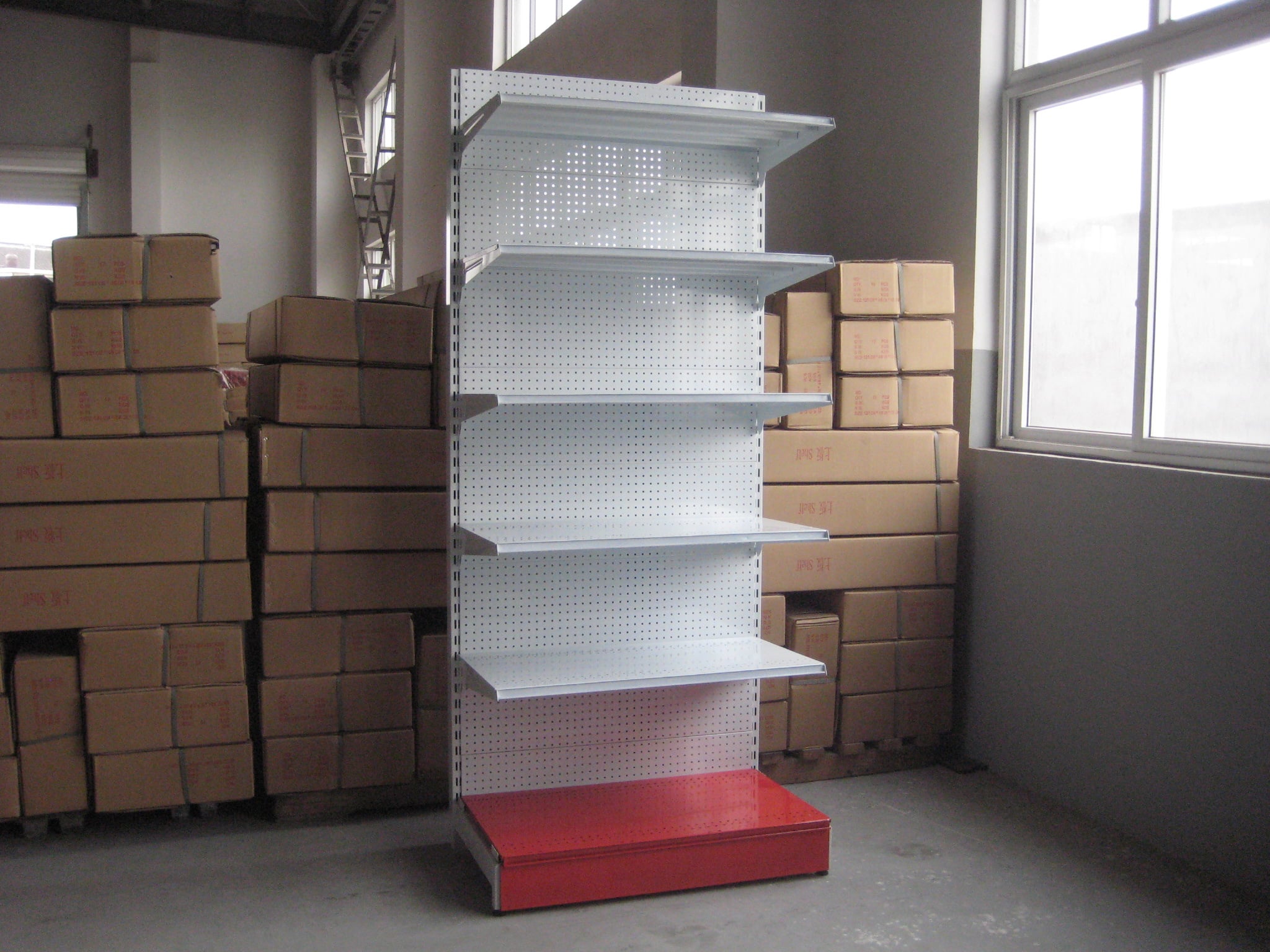 Why do large retailers invest in high-capacity warehouse rack systems?