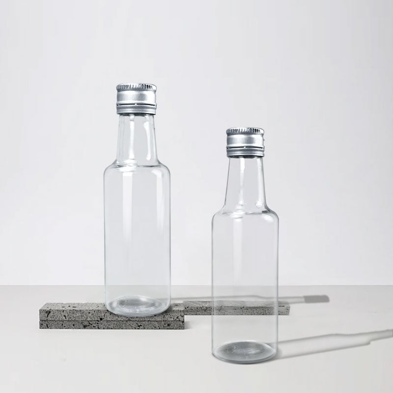 Custom 2oz Mini Plastic Juice Liquor Spirit Bottles with Aluminum Cap