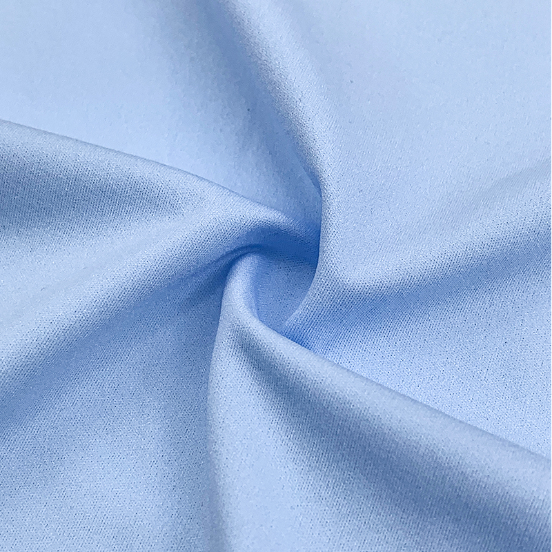Why Does Polyester Spandex Fabric Hold Creases Well for Pleated Skirts?