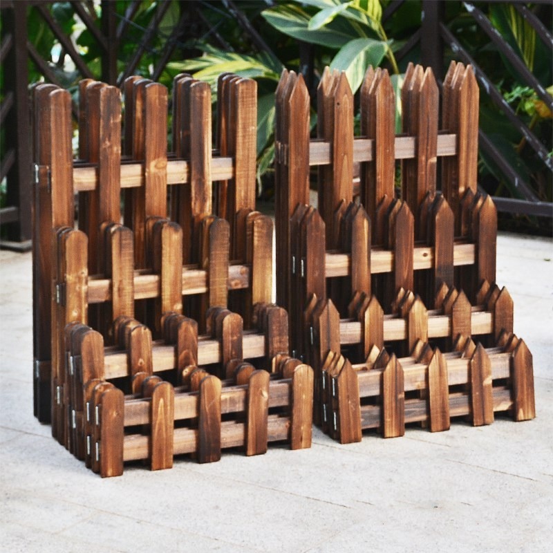 Valla de madera carbonizada