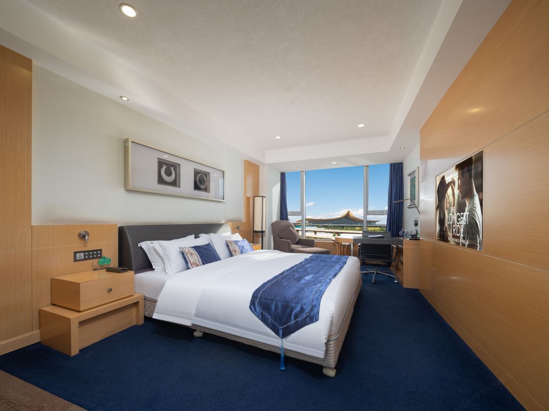 CHANGSHUI AIRPORT BAOLI HOTEL Double single bedroom