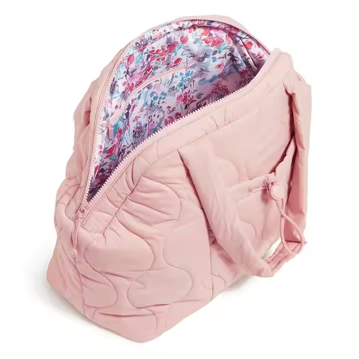 Why is the puffer tote bag a must-have winter accessory?