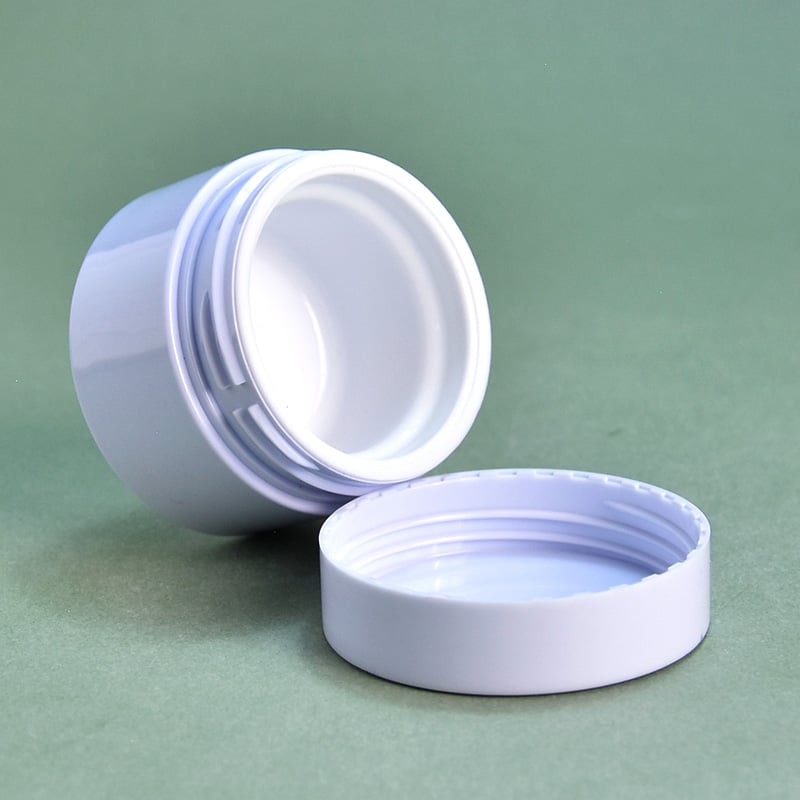 Vendita all'ingrosso di barattoli cosmetici in plastica per burro per labbra, contenitori cosmetici vuoti
