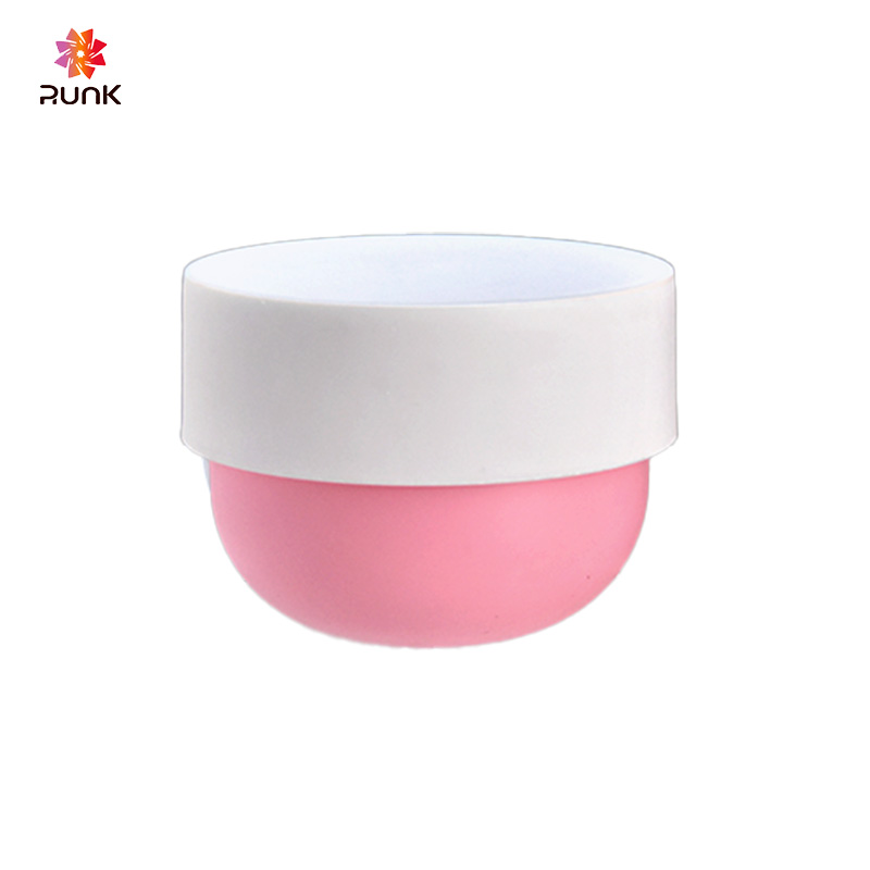 Vasi cosmetici rotondi con fondo rosa per creme per viso; vasi tre-in-uno per creme per mani