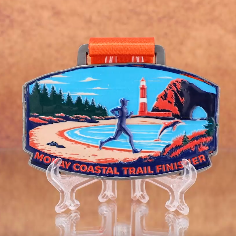 Scotland, Moray Coastal Trail Finisher Medal: Runner’s Silhouette with Lighthouse & Dolphins