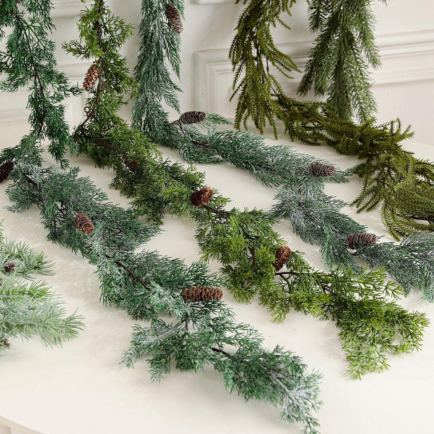 Which Christmas garland frame holds heavy add-on ornaments best?