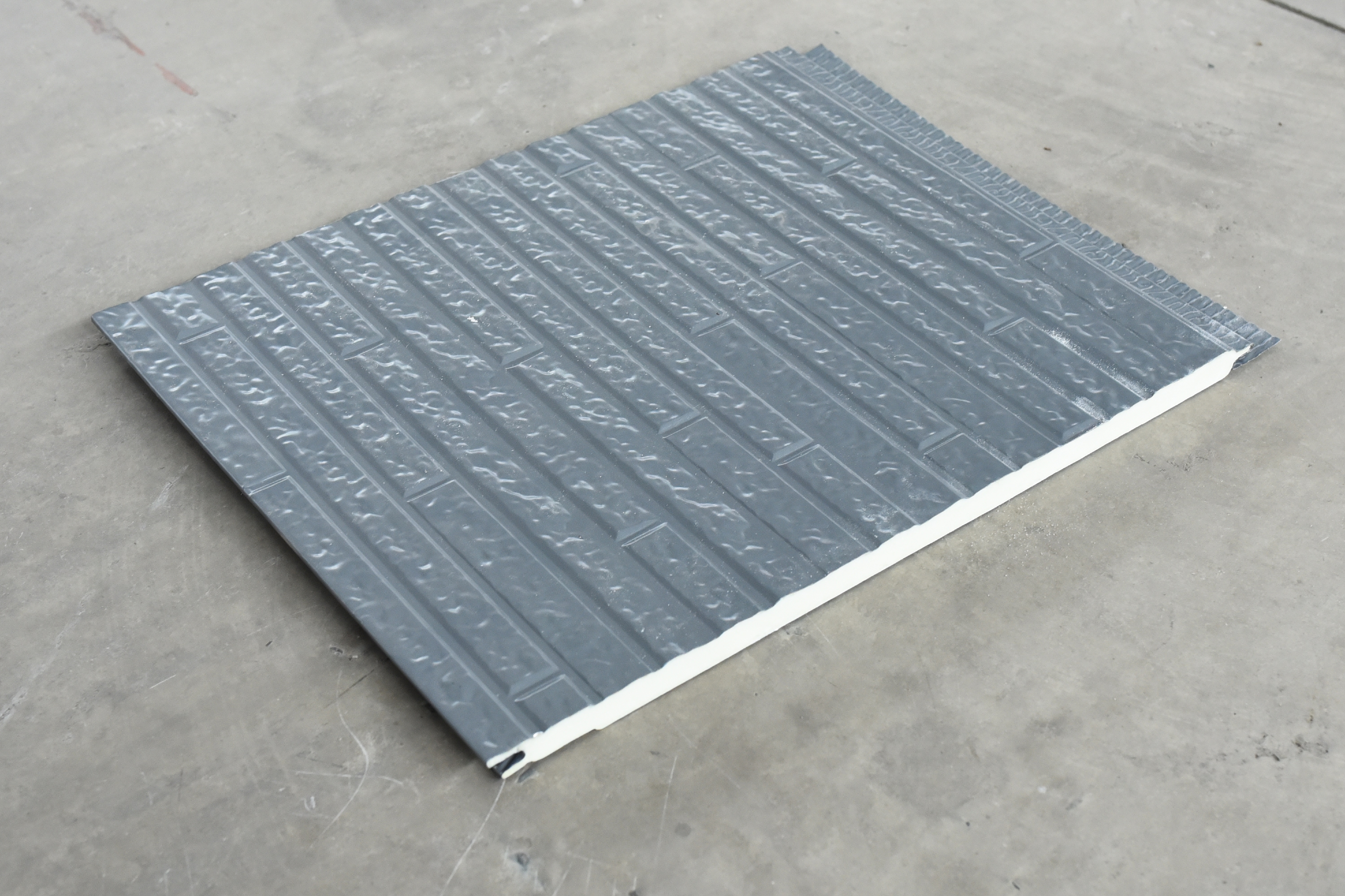 Durable and low-maintenance black metal siding options