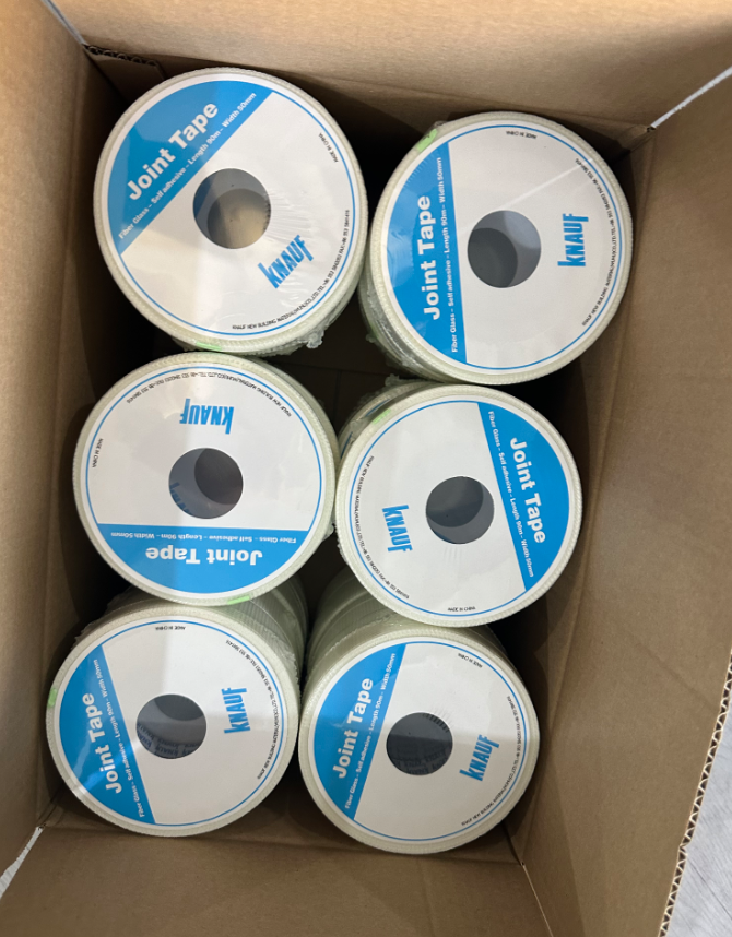 Can self adhesive fiberglass mesh tape stick on wet plaster?