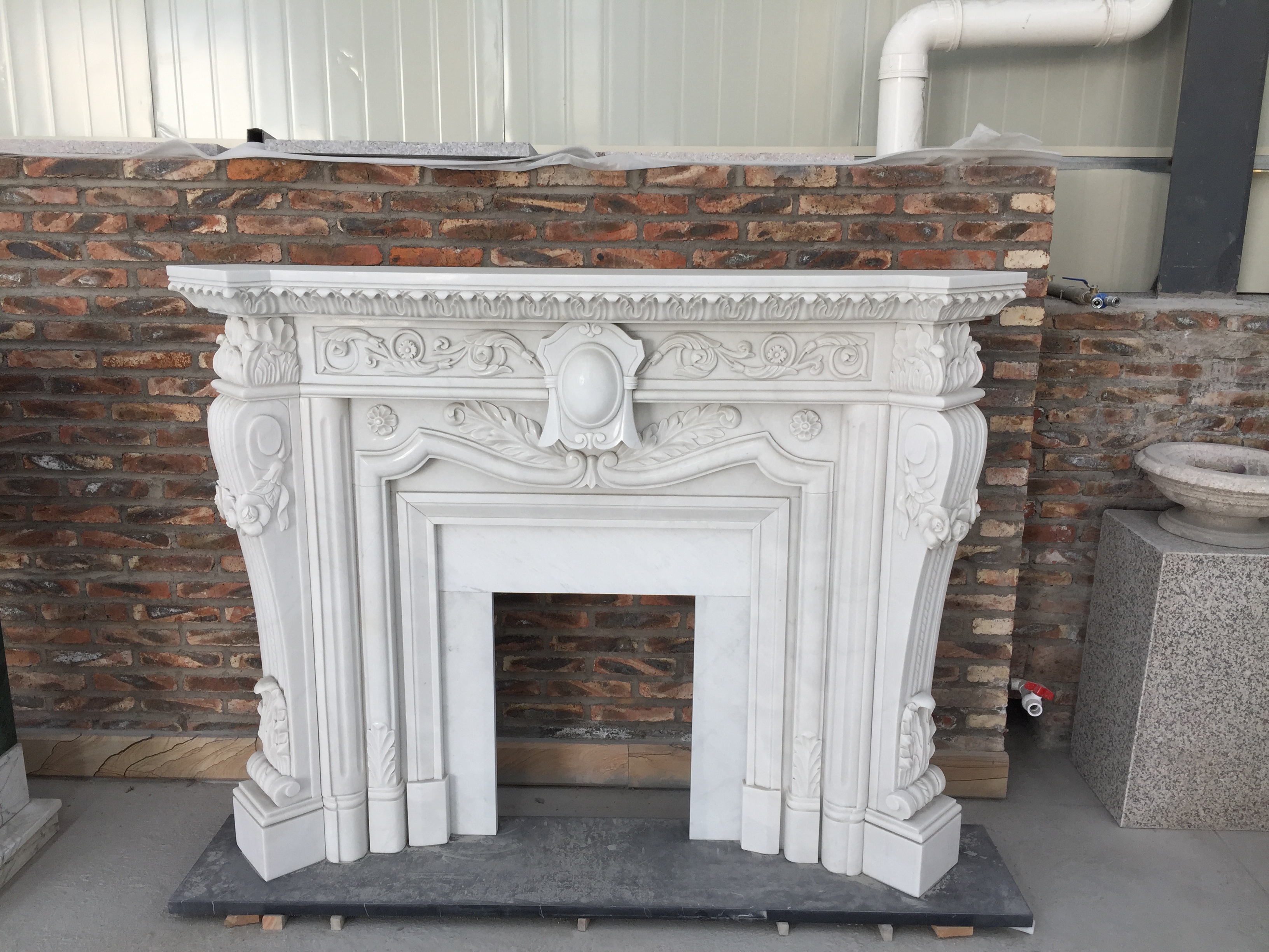 White Marble Fireplace Manufacturer supplier