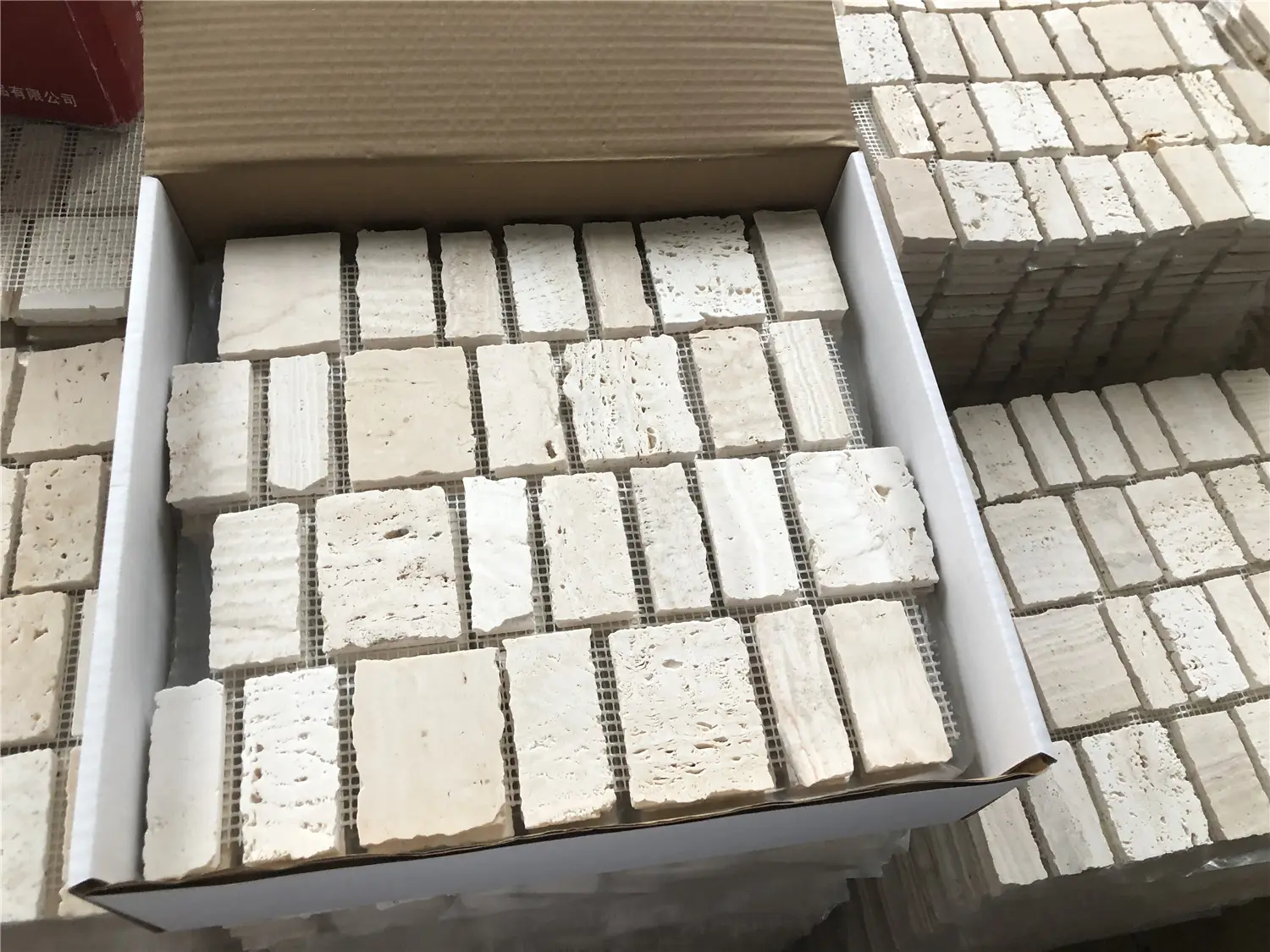 What scenes are stone mosaic tiles widely applied in luxury decoration?
