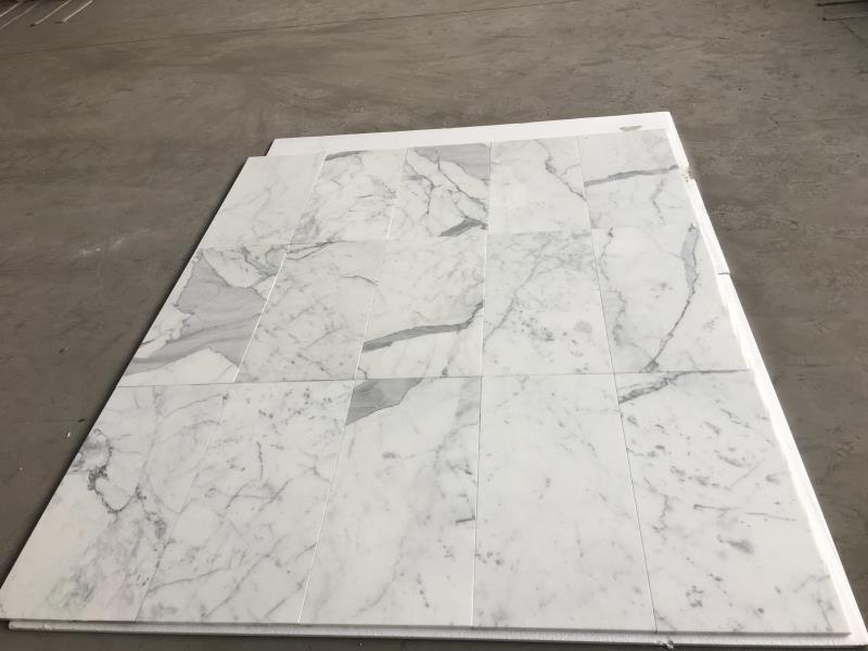 Plăci de gresie din marmură pentru locuințe de lux: ridicarea eleganței interioare