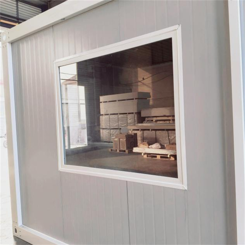 Close-up of tempered-glass window on Dongji House pre-built modular unit.jpg