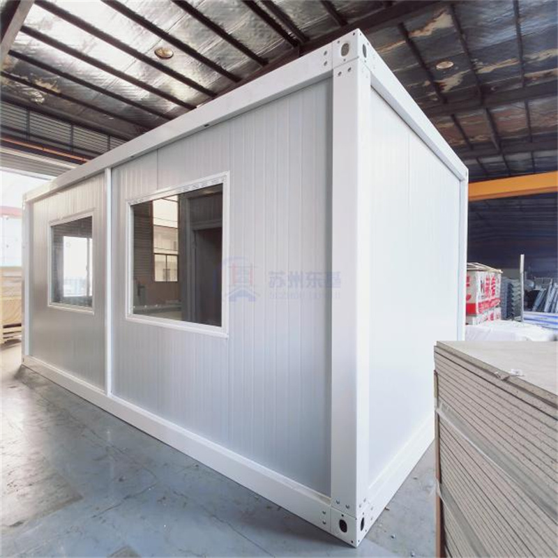 Side view of prefab modular home with large tempered-glass window.jpg