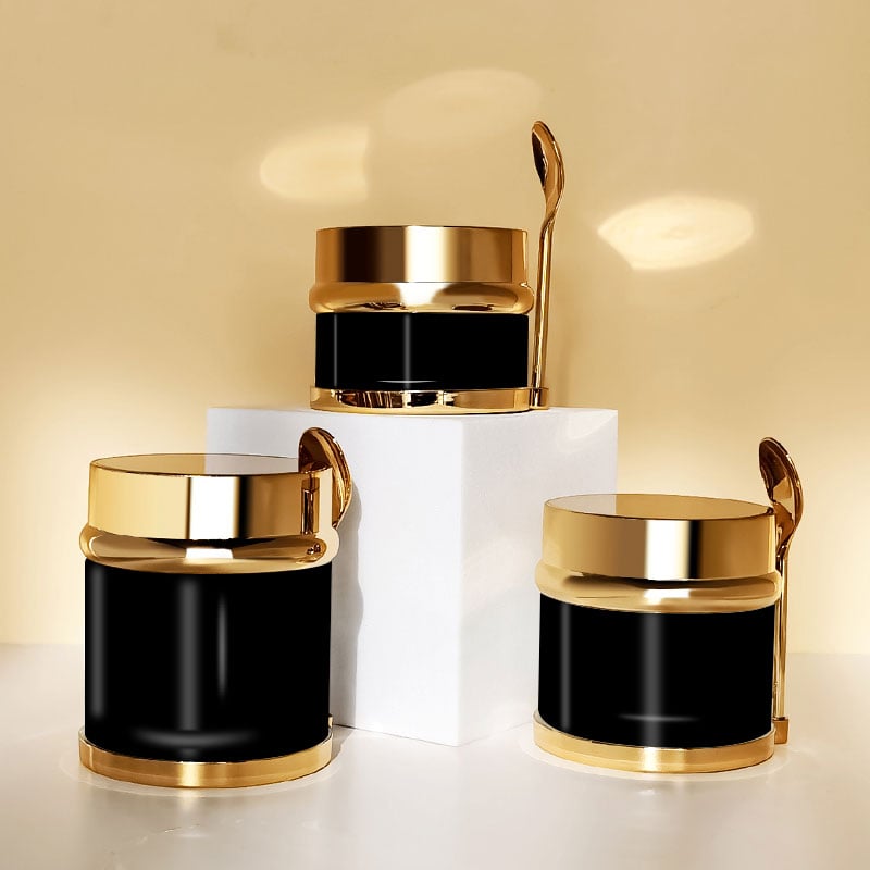 Custom Logo Eco-friendly Luxury Skincare Cream Jar Cosmetic 20ml 30ml 50ml Black Gold Cap Glass Bottle Jar with Spoon and Box