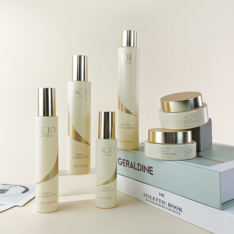 Slim cylinder light yellow glass skincare lotion bottles and jar HY-2459