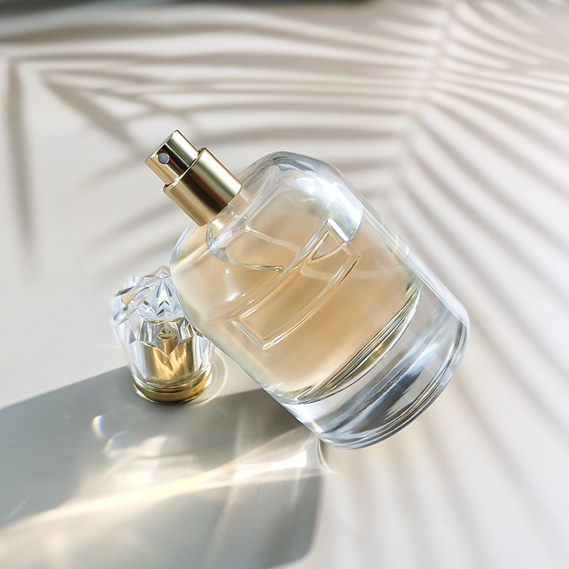 カスタム 高品質 ファッションシリンダー 豪華 100ml ラウンド ガラス香水ボトル アクリルキャップ付き