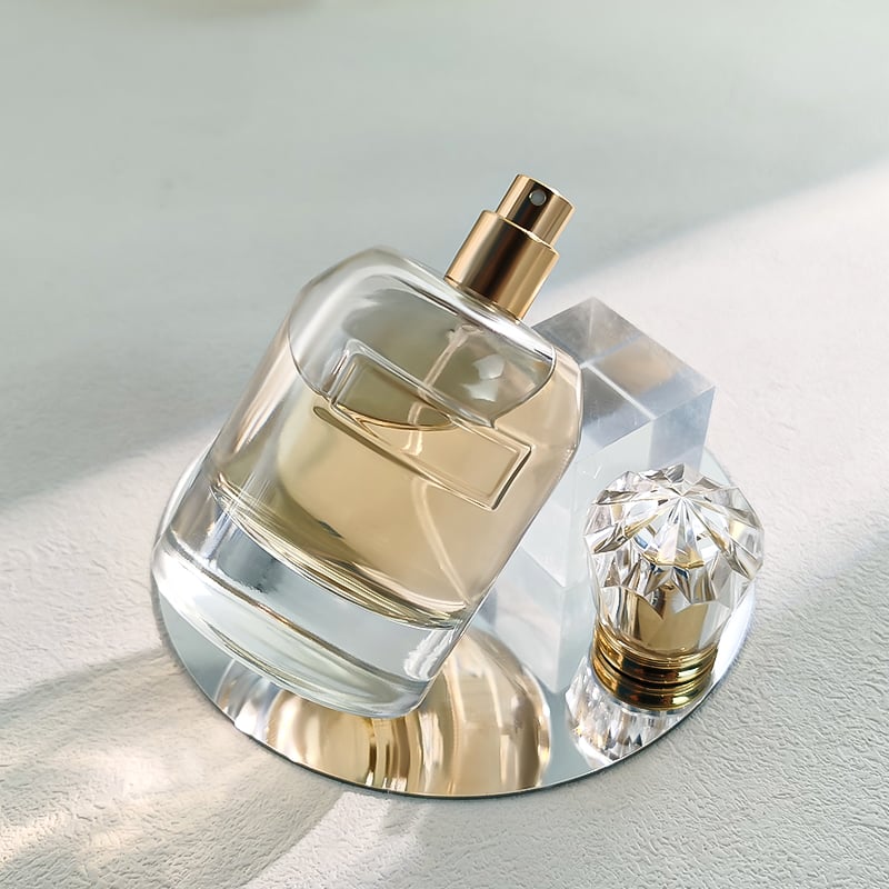 カスタム 高品質 ファッションシリンダー 豪華 100ml ラウンド ガラス香水ボトル アクリルキャップ付き