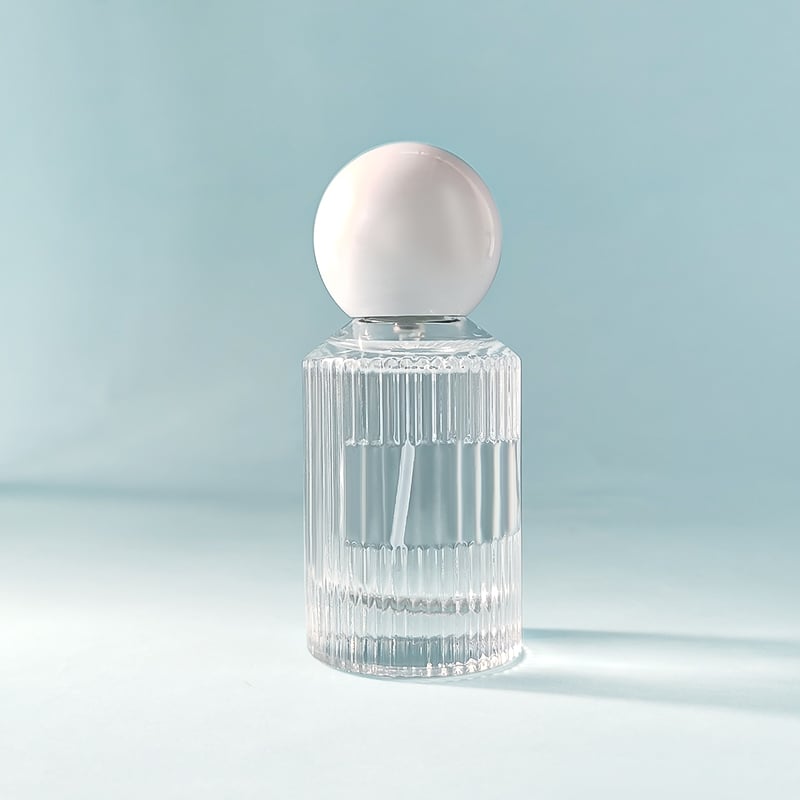 Special Hot Sale ODM OEM Clear Cylinder 30 ml Vertical Grain Perfume Bottle Glass with Packaging