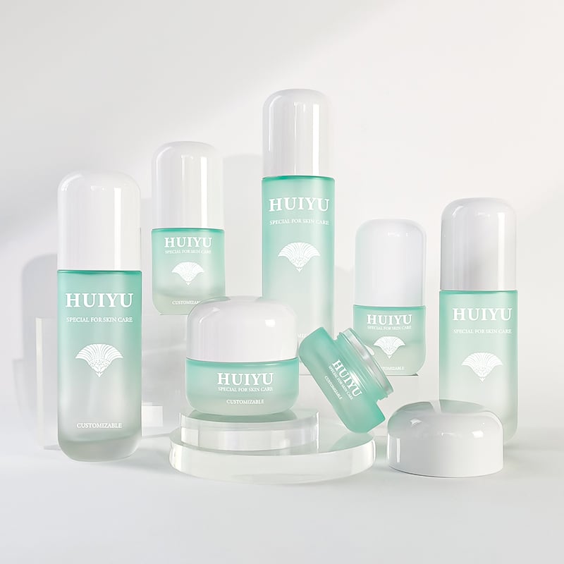 Gradient light green glass skincare bottles set with white caps HY-2458