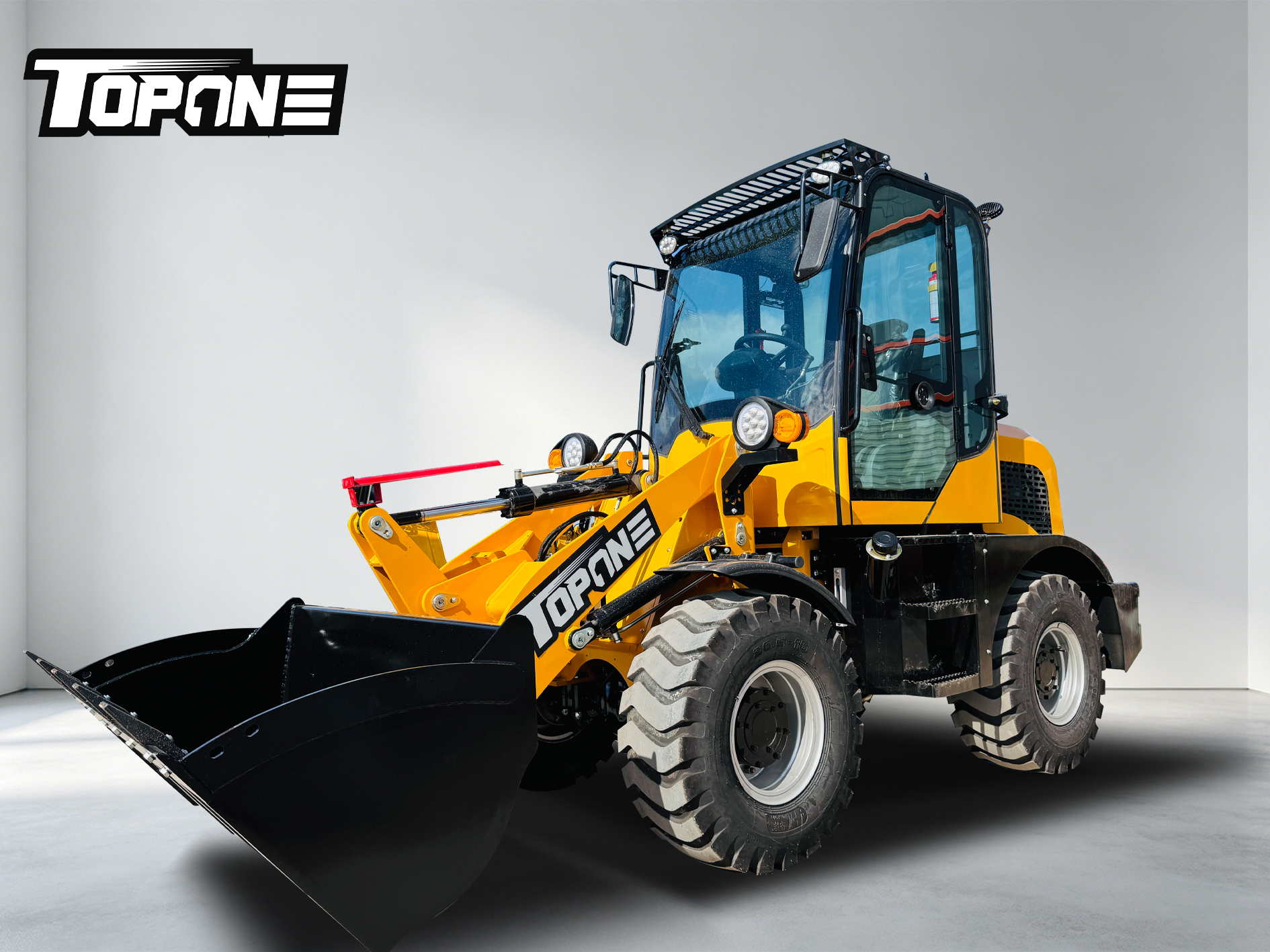 topone-tl908-compact-wheel-loader-with-cabin-studio-shot.jpg