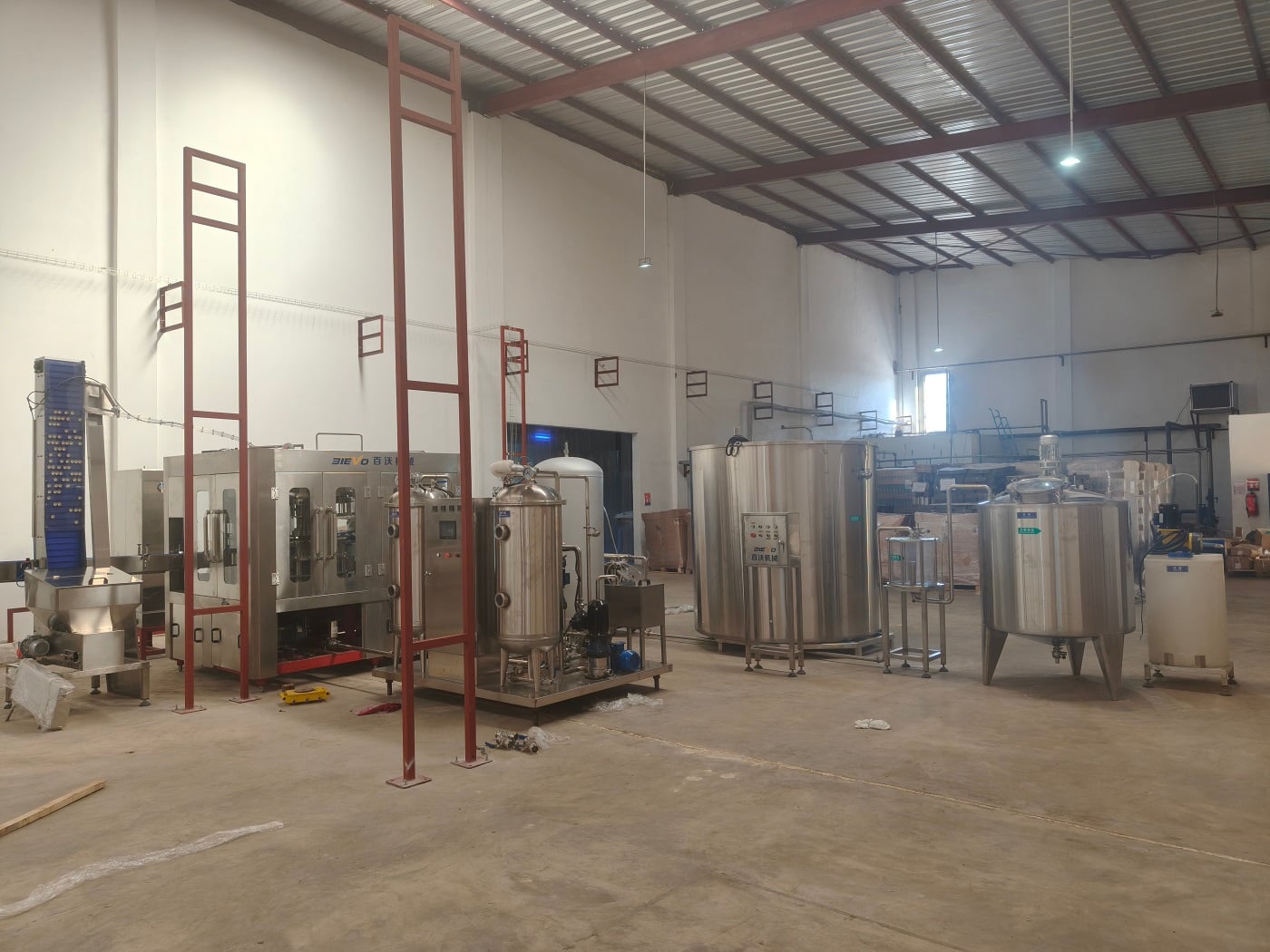 2000bph carbonated beverage filling production line for glass bottle in Benin