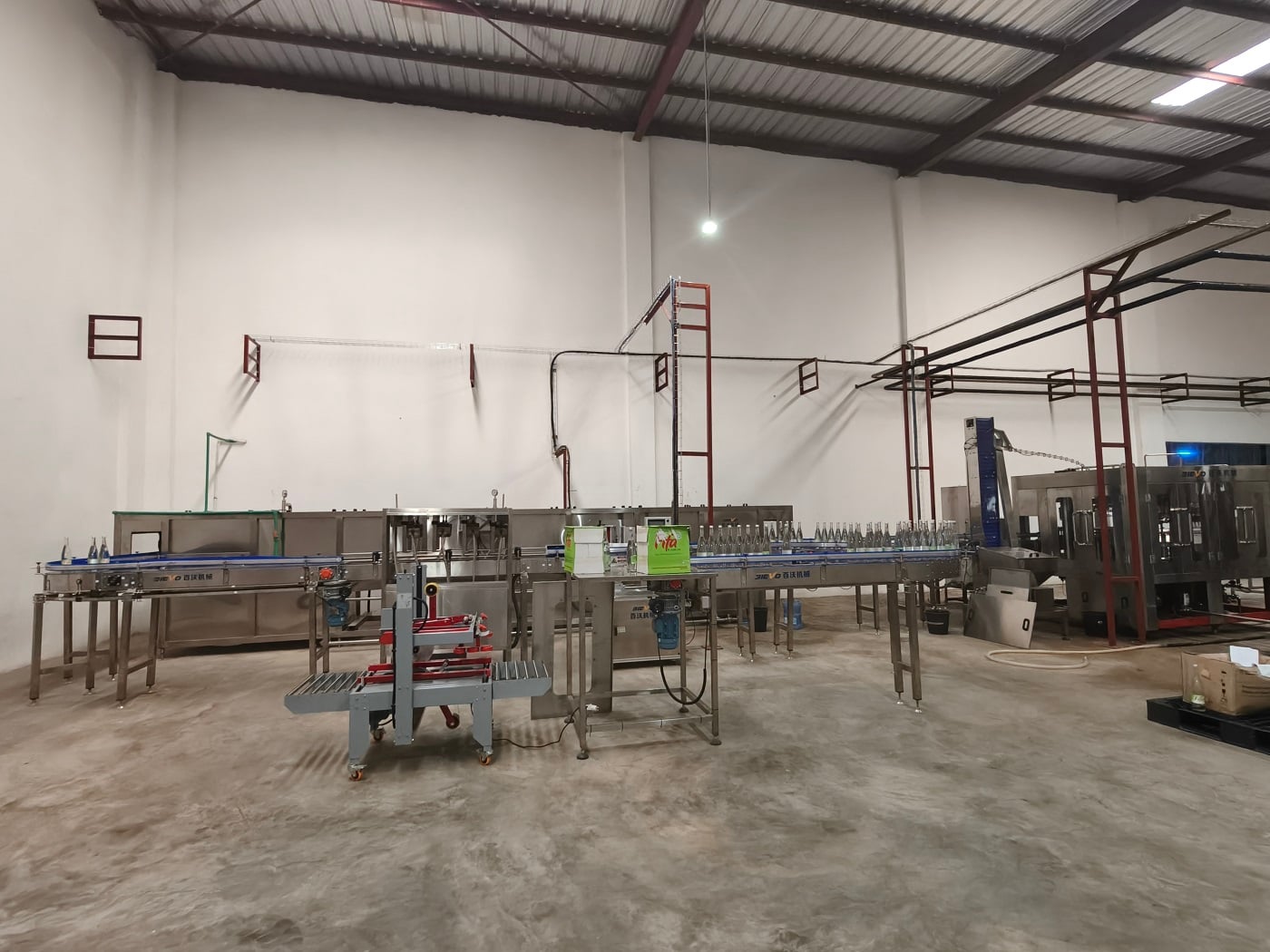 2000bph carbonated beverage filling production line for glass bottle in Benin