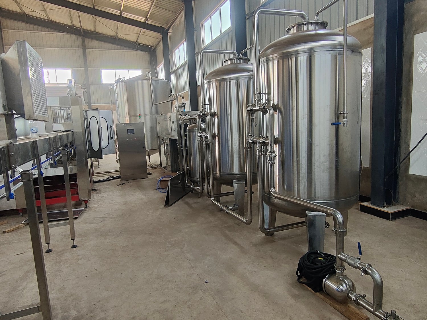 12000 bph water filling production line for PET bottle in Democratic Republic of the Congo