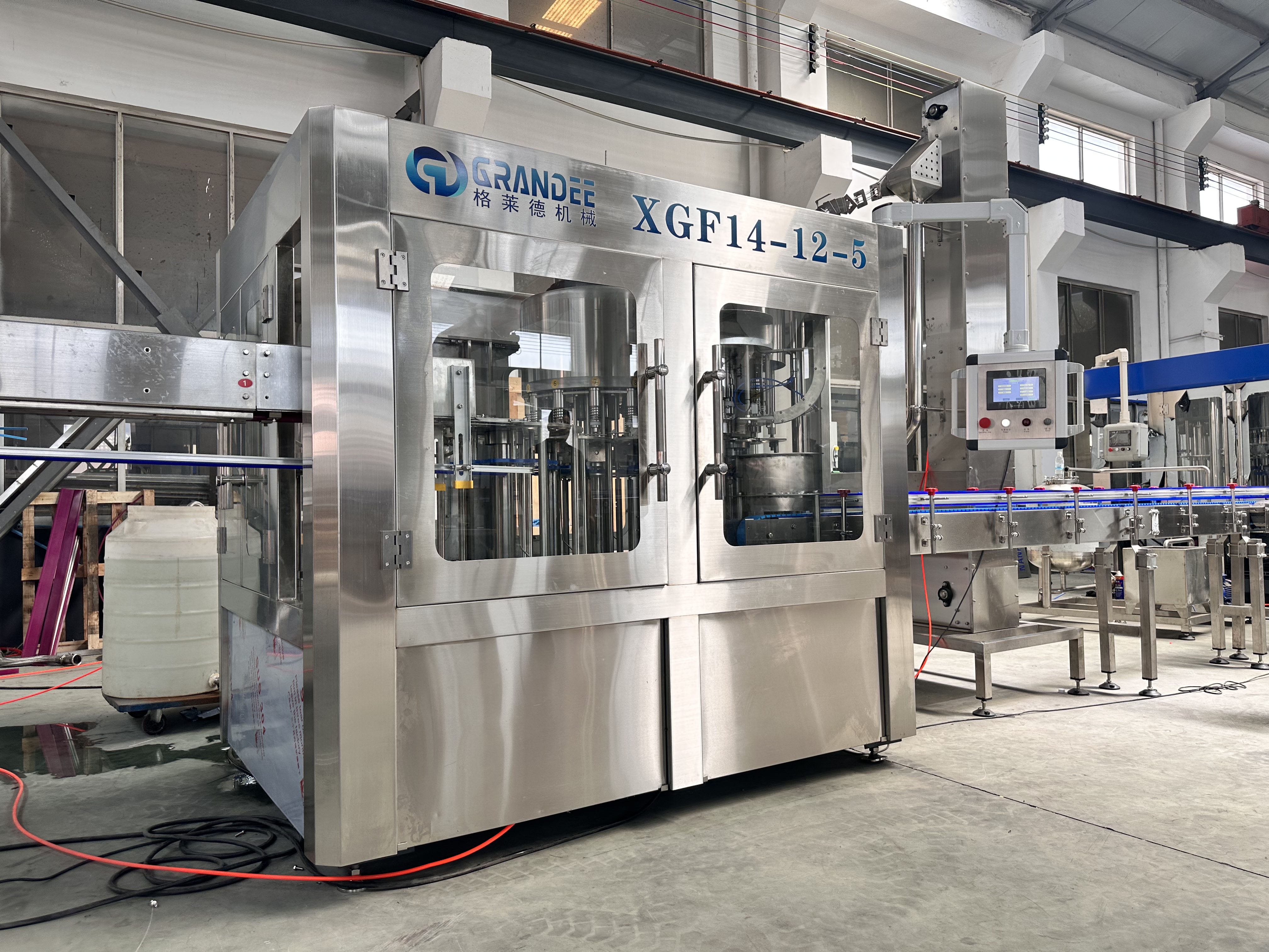 What Are the Benefits of Investing in a Low Cost Water Bottle Filling Machine?
