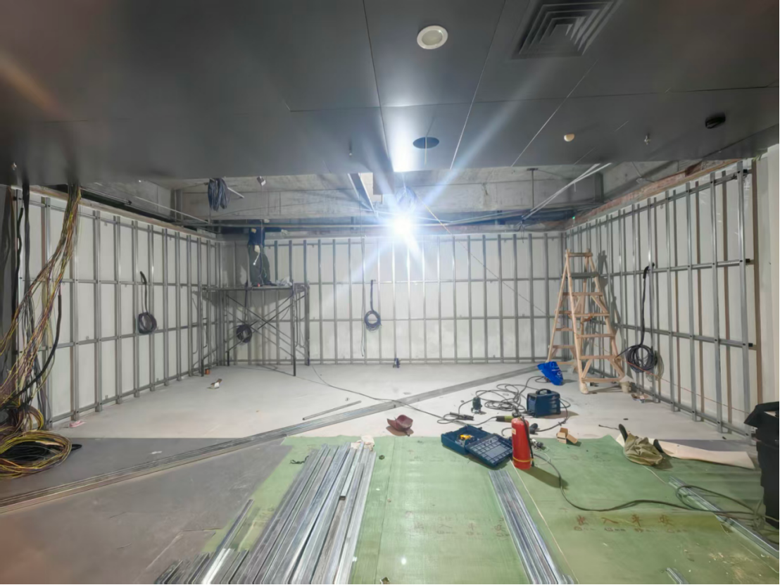 Constructing high-precision steel frame for 7.36m wide front LED wall in an immersive exhibition