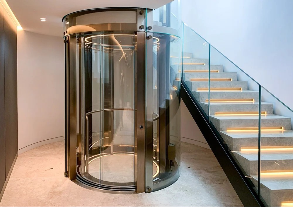Elevator drive technology, civil engineering requirements and long-term operational value for circular villas
