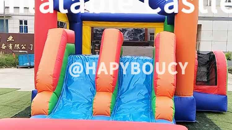 Colorful inflatable double-slide trampoline