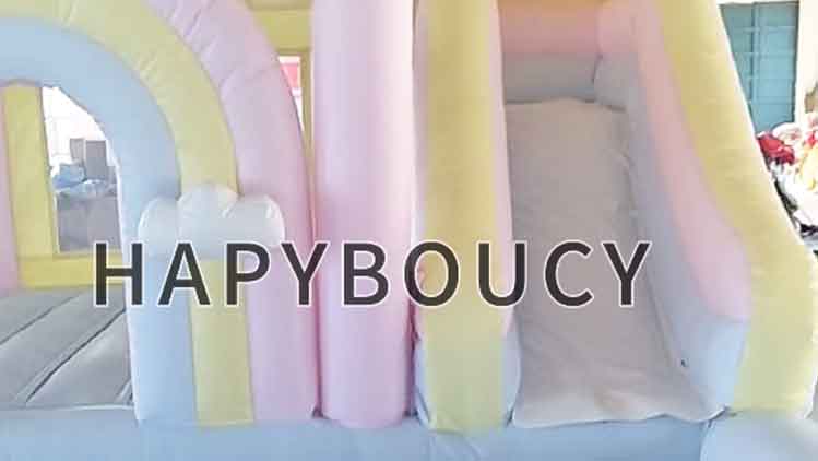 Rainbow inflatable trampoline with ball pool