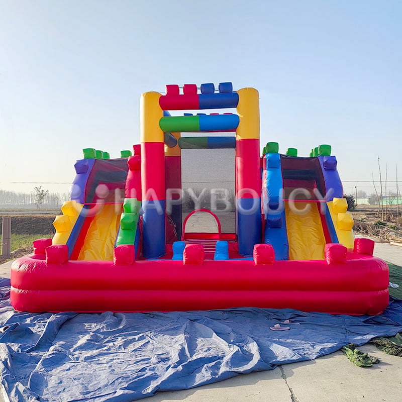 Dual Lane lego Bouncy Castle With Slide Building Blocks Bounce House with Slide for Sale