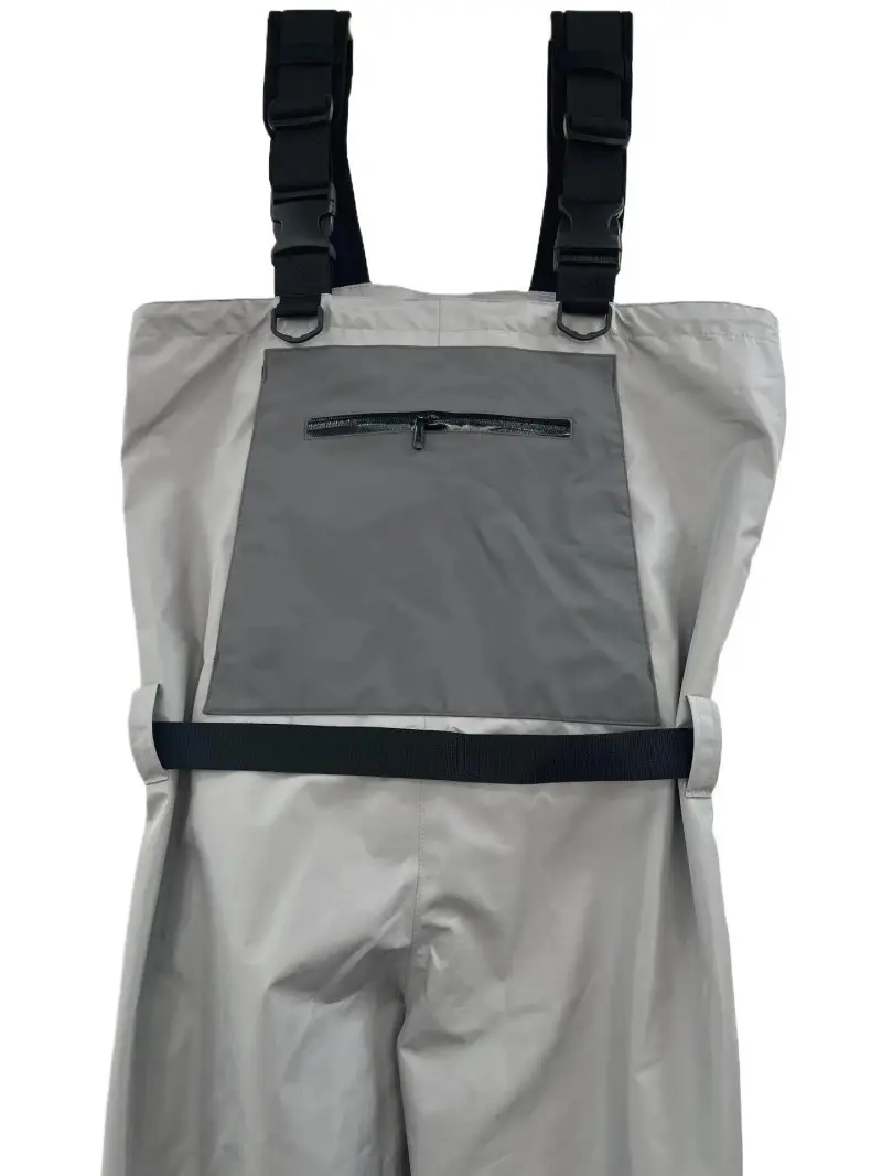 What makes neoprene waders puncture-resistant over breathable in rocky streams?