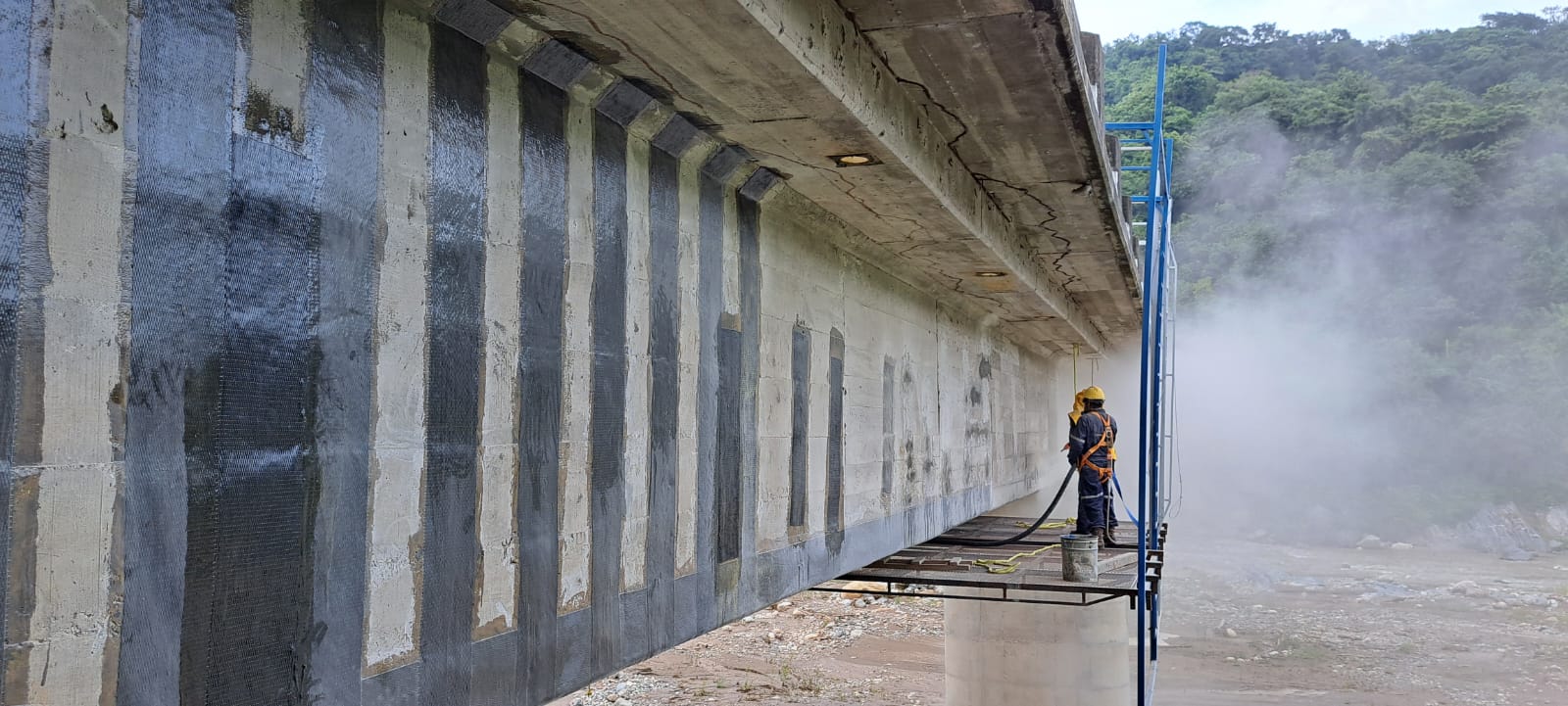 Bridge Reinforcement With CFRP Fabric and Laminates