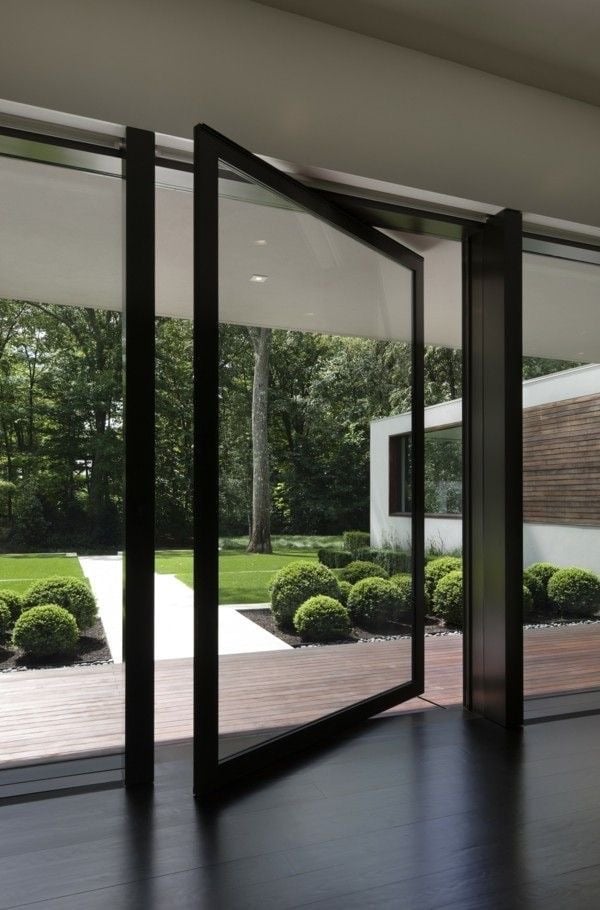 Using steel pivot doors for a sleek appearance.