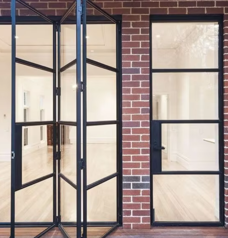 Using steel bifold doors for space-saving solutions.