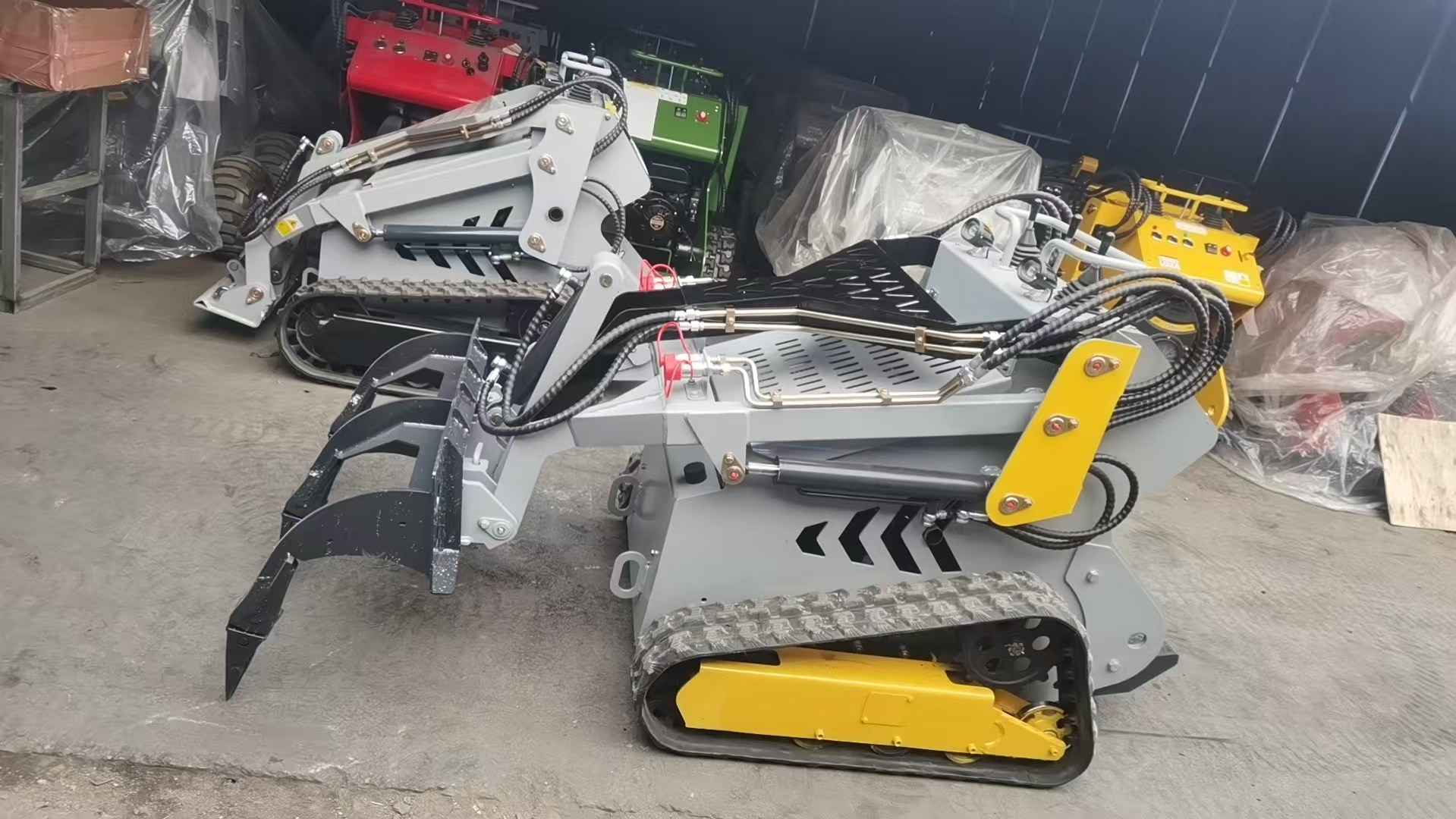 Hvilke tilbehør kan brukes med en skid steer loader?
