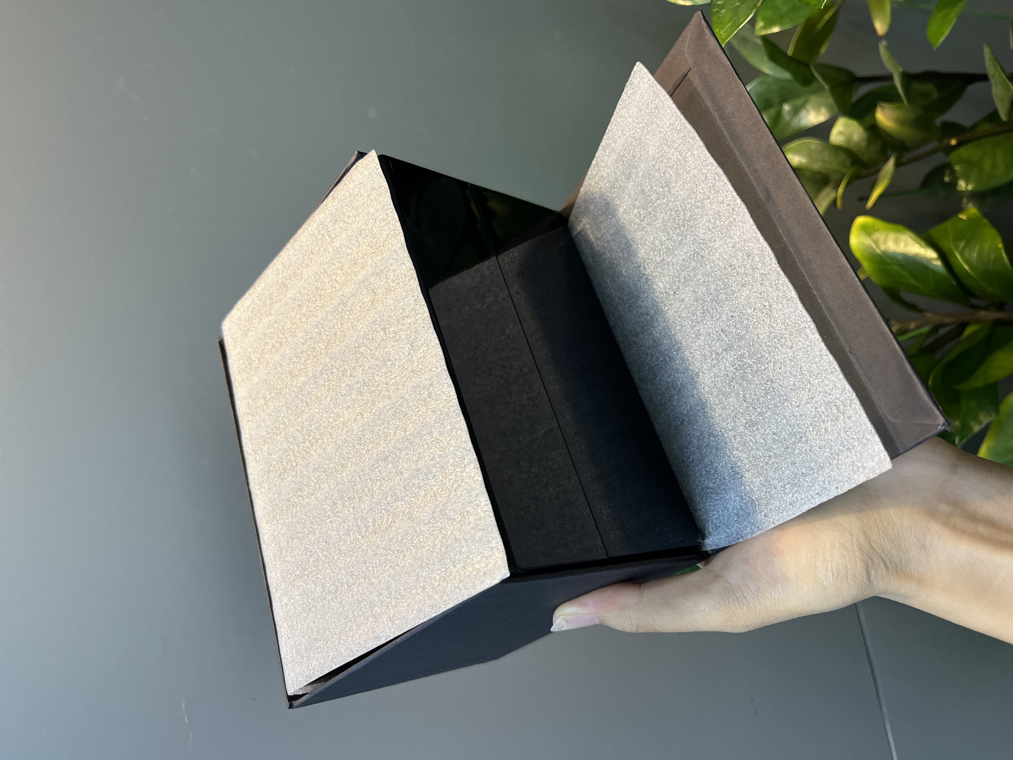 Black watch box with EPE foam protective pads inside the outer carton.JPG