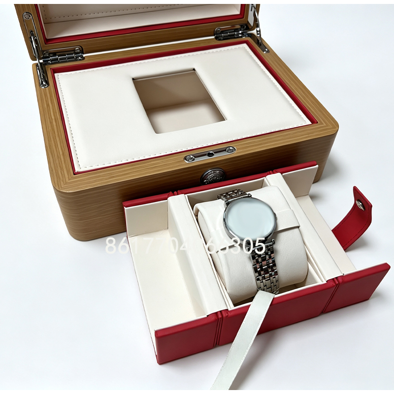 Wood watch box with red inner case holding a watch for display.jpg