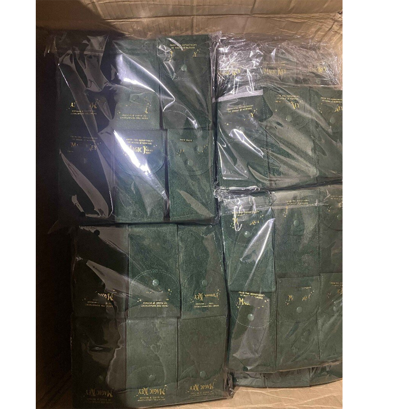 Bulk packed microfiber suede watch travel pouches ready for shipment.jpg